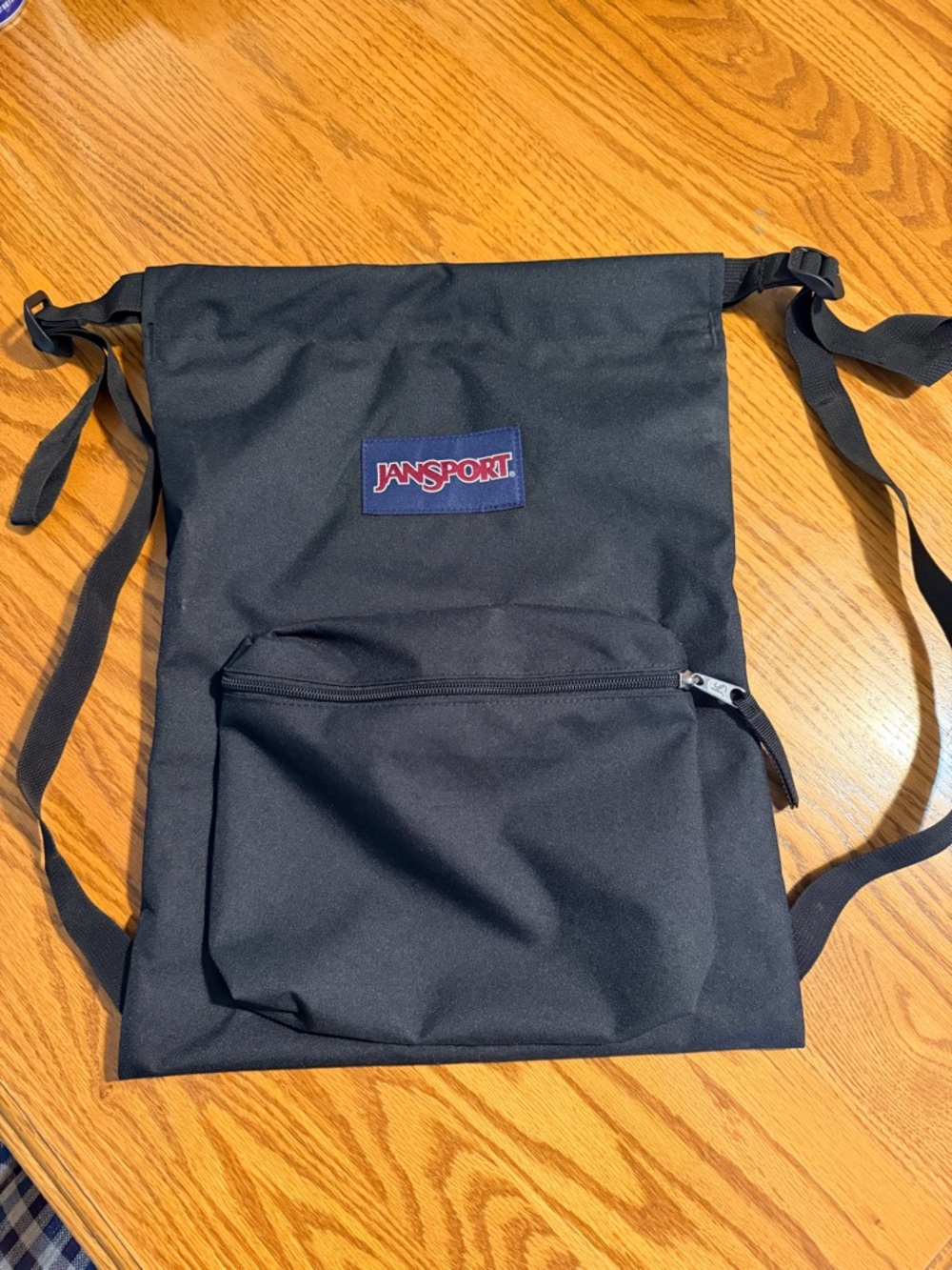 Jansport Black Drawstring Backpack with Front Zip Pocket